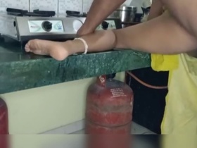 Tamil men recite Bondati Tangachi in the kitchen