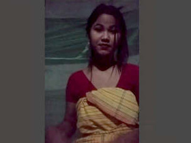 Adorable young woman gets intimate with herself