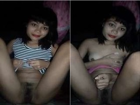 A cute girl flaunts her breasts, butt, and pussy