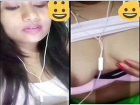 Indian girl with a pretty face reveals her breasts on video call