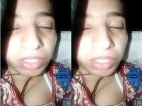 Horny girl masturbates with fingers in front of camera