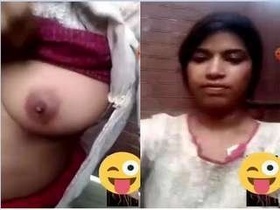 Pretty Pakistani girl bares her breasts