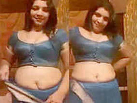 Desi aunty shows off her boobs, ass, and pussy in high-class attire