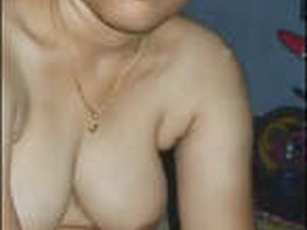 Mature bhabhi's steamy video with her lover
