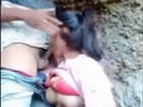 College student gives a quick blowjob outdoors