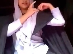 Stunning woman pleasuring herself