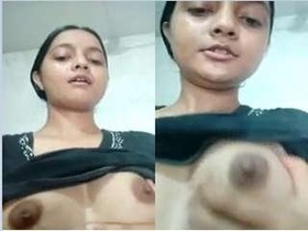 Cute webcam girl flaunts her assets on camera