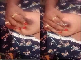 Desi bhabhi flaunts her big boobs in a solo video