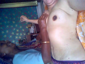 Desi auntie gives a massage to her master