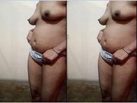 Watch as this hot bhabhi strips down and bares it all