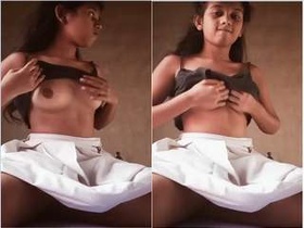 Exclusive cute girl from Assam flaunts her breasts and masturbates with her hands