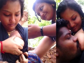 A Malayali woman performs oral sex on breasts in public
