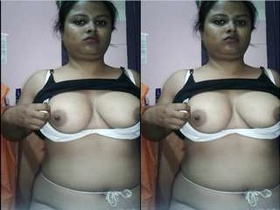 Exclusive video of a Desi girl displaying her breasts and genitals