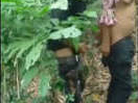 A village girl and her partner have sex in the woods