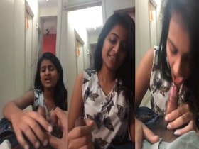 A young college student performs oral sex on her partner in a sex video
