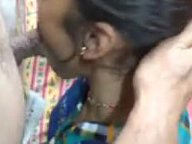 Indian wife gives a sensual blowjob to her husband