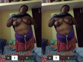Exclusive video of a sexy Indian bhabhi flaunting her big boobs