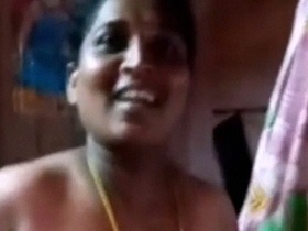 Indian wife flaunts her big boobs and sexy curves in a nude video