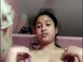Desi babe flaunts her boobs and pussy in a seductive display