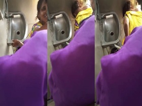 A voyeur records a public sexual encounter between two people of South Asian descent on a train