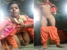 Rustic beauty bares her breasts and intimate parts