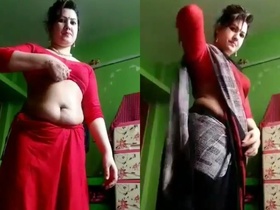Married Bhabi flaunts her beauty in a red saree and removes it