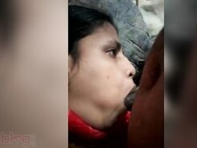 Randy, a stunning girl, gives a sensual blowjob in the dark