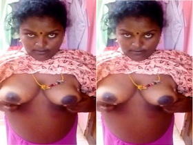 Mallu bhabhi flaunts her breasts in a titillating video