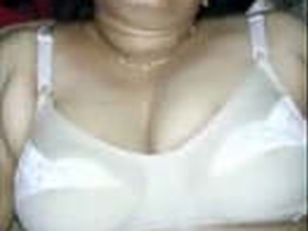 Chubby aunt with big breasts ready for sexual encounter