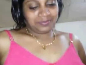 Curvy aunty from South India flaunts her large breasts and wet pussy