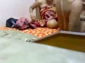 Desi Budi has an intimate encounter with her secret lover in his home