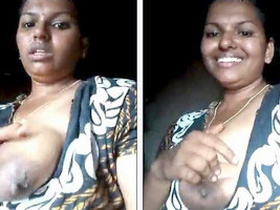 Auntie's massive natural breasts on full display for neighbors