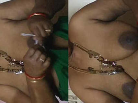 Tamil aunty's big breasts in hardcore video