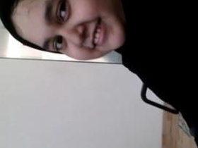 Shamiya, a stunning Indian woman, giving a handjob in a beauty salon and flaunting her natural, large breasts