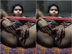 Bhabhi flaunts her large breasts and pleasures herself with her hands
