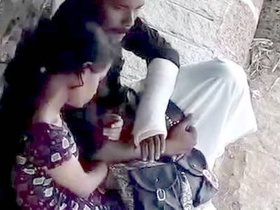 Girlfriend pleases her partner with a handjob in the great outdoors