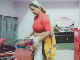 Indian aunty Sadaf works out in sexy dress