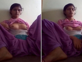 Desi Indian teen masturbates in purple outfit