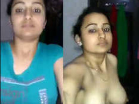 Indian girl flaunts her breasts and pleasures herself with her fingers