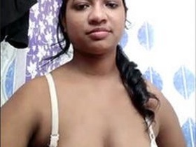 Beautiful bhabhi flaunts her big boobs in the bathroom