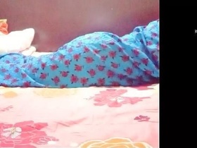 Sister enjoys massage from brother while recording Hindi audio