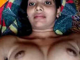 Indian desi girl gets naked and awaits sex partner to penetrate her with a sex toy