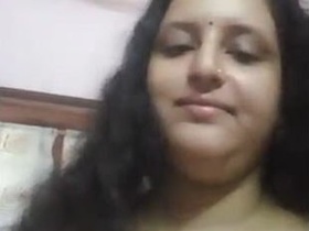 Busty desi bhabhi reveals her pussy and breasts