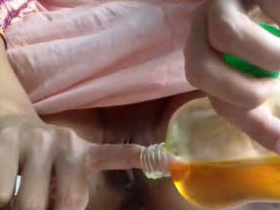 Horny amateur girl pleasures herself with mustard oil