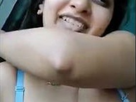 Cute teen with her lover in a steamy sex tape