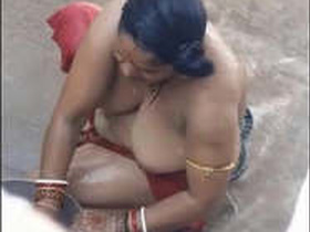 Mature Bhabhi soaps up in the great outdoors