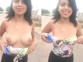 Cute girlfriend exposes her hot breasts in public