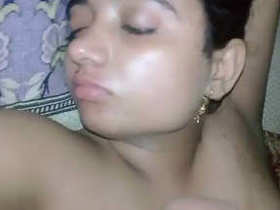 A stunning teenage girl and her partner share intimate moments in this steamy video