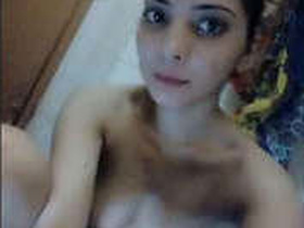 Desi girl takes a nude selfie and shows off her perky breasts