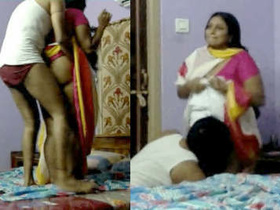 Awesome Tamil aunty with big butts fucks young guy